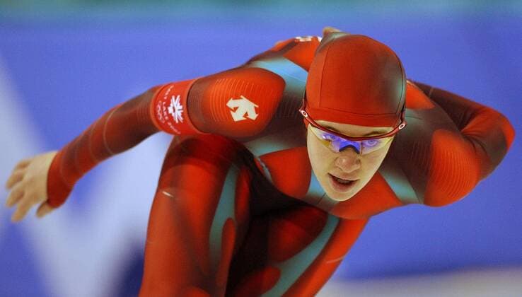 Feb 24, 2002; Salt Lake City, UT, USA; Canada s Clara Hughes fights off pain to bear down on final laps of women s 5,000-metre speed skating event. Former Olympic cycling medallist was third.. OLYMPICS 2002 Salt Lake City  - ZUMAt14_