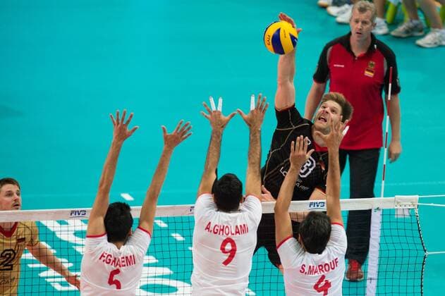 17.09.2014, Spodek, Kattowitz Volleyball, FIVB Volleyball Men s World Championship 2014, 3. Runde, Deutschland (GER) vs. Iran (IRI) Block Dreierblock Farhad Ghaemi ( 5 IRI), Adel Gholami ( 9 IRI), Mir Saeid Marouflakrani ( 4 IRI) - Angriff Sebastian Schwarz ( 3 GER)