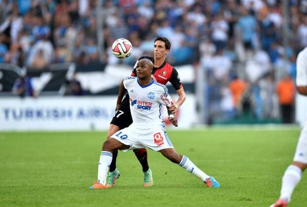 Andre Ayew (om) - Vincent Pajot (ren) FOOTBALL : Marseille vs Rennes - Ligue 1 - 20 09 2014 AnthonyBIBARD FEP Panoramic 