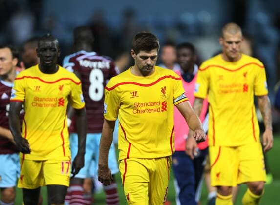 Liverpool s Steven Gerrard looks dejected at full time - Barclays Premier League - West Ham United vs Liverpool - Upton Park - England - 20th September 2014 - Picture David Klein Sportimage EDITORIAL USE ONLY. No use with unauthorised audio, video, data, fixture lists, club league logos or live services. Online in-match use limited to 120 images, no video emulation. No use in betting, games or single club league player publications.
