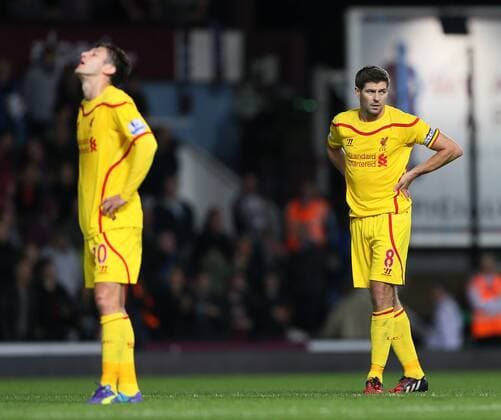 Liverpool s Steven Gerrard looks dejected at full time - Barclays Premier League - West Ham United vs Liverpool - Upton Park - England - 20th September 2014 - Picture David Klein Sportimage EDITORIAL USE ONLY. No use with unauthorised audio, video, data, fixture lists, club league logos or live services. Online in-match use limited to 120 images, no video emulation. No use in betting, games or single club league player publications.