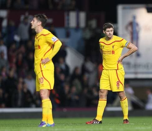 Liverpool s Steven Gerrard looks dejected after going 3-1 down - Barclays Premier League - West Ham United vs Liverpool - Upton Park - England - 20th September 2014 - Picture David Klein Sportimage EDITORIAL USE ONLY. No use with unauthorised audio, video, data, fixture lists, club league logos or live services. Online in-match use limited to 120 images, no video emulation. No use in betting, games or single club league player publications.