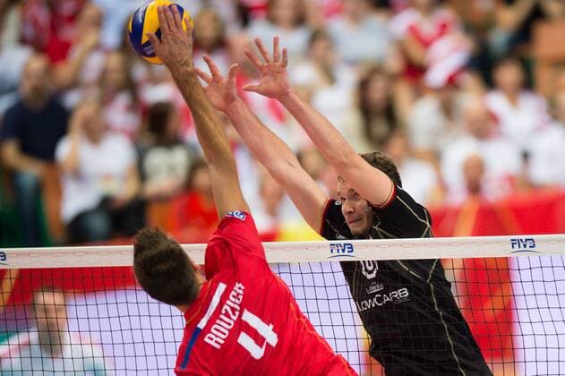 21.09.2014, Spodek, Kattowitz Volleyball, FIVB Volleyball Men s World Championship 2014, Spiel Platz 3 4, Deutschland (GER) vs. Polen (POL) Angriff Antonin Rouzier ( 4 FRA) - Block Denis Kaliberda ( 6 GER)
