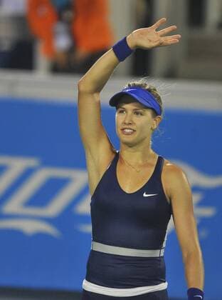 Canada s Eugenie Bouchard waves during the women s singles match at the WTA Tennis Damen Wuhan Open tennis tournament in Wuhan capital of central China s Hubei Province, on Sept. 23, 2014. ) (djj) (SP)CHINA-WUHAN-TENNIS-WUHAN OPEN-BOUCHARD XiaoxYijiu 