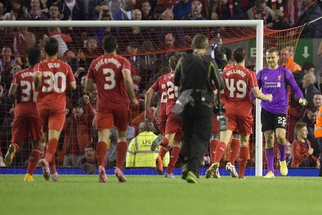 Simon Mignolet of Liverpool celebrates victory with team mates - Liverpool vs. Middlesbrough - Capital One League Cup - Anfield - Liverpool - 23 09 2014 Pic Philip Oldham Sportimage EDITORIAL USE ONLY. No use with unauthorised audio, video, data, fixture lists, club league logos or live services. Online in-match use limited to 120 images, no video emulation. No use in betting, games or single club league player publications.