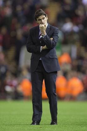 Aitor Karanka, Middlesbrough manager looks nervous during penalties - Liverpool vs. Middlesbrough - Capital One League Cup - Anfield - Liverpool - 23 09 2014 Pic Philip Oldham Sportimage EDITORIAL USE ONLY. No use with unauthorised audio, video, data, fixture lists, club league logos or live services. Online in-match use limited to 120 images, no video emulation. No use in betting, games or single club league player publications.