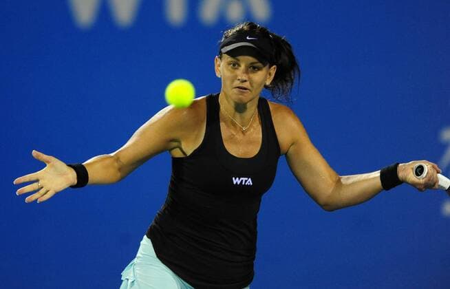 (140924) -- WUHAN, Sept. 24, 2014 -- Australia s Casey Dellacqua returns a shot during the women s singles 3rd round match at the WTA Tennis Damen Wuhan Open tennis tournament in Wuhan, capital of central China s Hubei Province, on Sept. 24, 2014. HaoxTongqian 