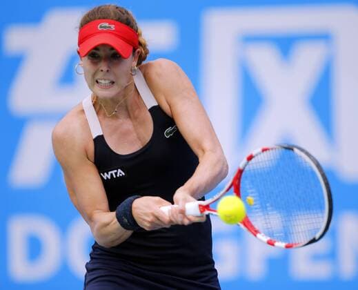 Alize Cornet of France returns a shot during the women s singles third round of the 2014 WTA Tennis Damen Wuhan Open tennis tournament in Wuhan city, central China s Hubei province, 24 September 2014.  20140924_31696
