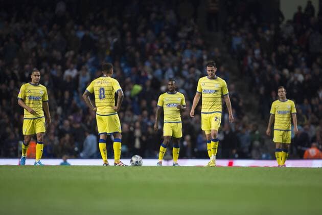 Sheffield Wednesday look dejected following the third goal - Manchester City vs. Sheffield Wednesday - Capital One League Cup - Anfield - Liverpool - 24 09 2014 EDITORIAL USE ONLY. No use with unauthorised audio, video, data, fixture lists, club league logos or live services. Online in-match use limited to 120 images, no video emulation. No use in betting, games or single club league player publications.