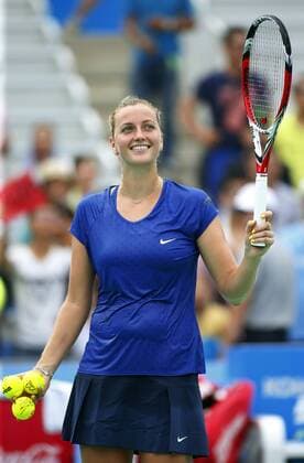 Petra Kvitova of the Czech Republic smiles during the women s singles quarter-finals of the 2014 WTA Tennis Damen Wuhan Open tennis tournament in Wuhan city, central China s Hubei province, 25 September 2014.  20140925_11197