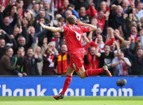 Steven Gerrard of Liverpool celebrates his goal - Barclays Premier League - Liverpool vs Everton - Anfield Stadium - Liverpool - England - 27th September 2014 - EDITORIAL USE ONLY. No use with unauthorised audio, video, data, fixture lists, club league logos or live services. Online in-match use limited to 120 images, no video emulation. No use in betting, games or single club league player publications.