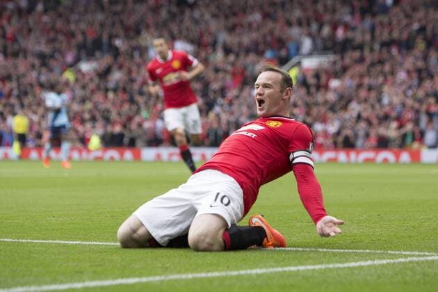 Wayne Rooney of Manchester United celebrates his opening goal - Manchester United vs. West Ham United - Barclay s Premier League - Old Trafford - Manchester - 27 09 2014 Pic Philip Oldham Sportimage EDITORIAL USE ONLY. No use with unauthorised audio, video, data, fixture lists, club league logos or live services. Online in-match use limited to 120 images, no video emulation. No use in betting, games or single club league player publications.