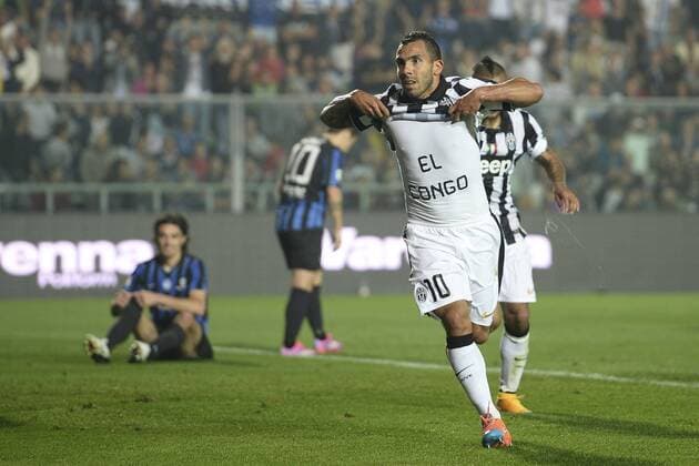 Bergamo 27 09 2014 - serie A Atalanta Bergamo - Juventus Turin - Carlos Tevez jubelt mit einer Botschaft auf dem Trikot - El Congo - 