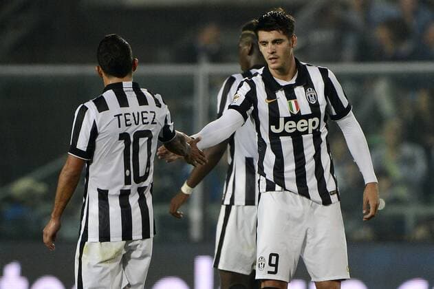 Esultanza gol di Alvaro Morata con Carlos Tevez Juventus 0-3. Celebration goal Bergamo 27-09-2014 Stadio Atleti Azzurri d Italia - Football Calcio Serie A Atalanta - Juventus. Foto Giuseppe Celeste Insidefoto giuseppexceleste