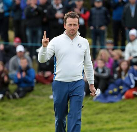 Europe s Graeme McDowell celebrates victory in the afternoon foursomes match against USA s Jimmy Walker and Rickie Fowler on the second day of the 2014 Ryder Cup in Gleneagles,Scotland on September 27, 2014.  LON2014092754