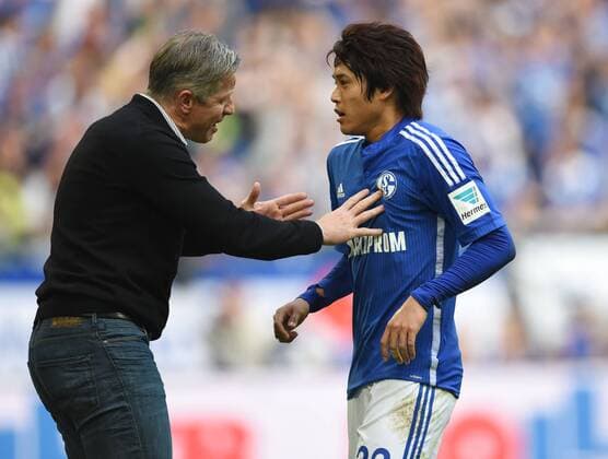 27.09.2014, Fussball, Saison 2014 15, 1. Bundesliga, 6. Spieltag, FC Schalke 04 - Borussia Dortmund 2:1 Trainer Jens Keller (Schalke 04), li., und Atsuto Uchida (Schalke 04)