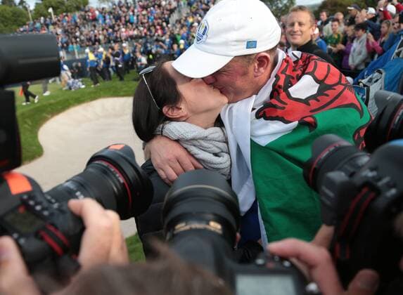Europe s jamie Donaldson kisses his wife after securing the final point to beat USA on the final day of the 2014 Ryder Cup in Gleneagles,Scotland on September 28, 2014.  LON2014092844