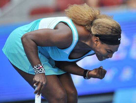Serena Williams of the United States reacts to her score during the women s 1st round match at the 2014 China Open in Beijing, capital of China, on Sept. 29, 2014. (SP)CHINA-BEIJING-TENNIS-CHINA OPEN LixWen 