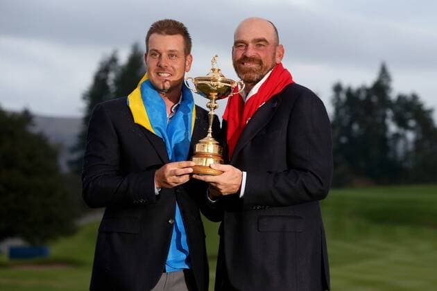 GOLF - PGA, Ryder Cup 2014 PERTHSHIRE,SCOTLAND,28.SEP.14 - GOLF - PGA Golf Herren Tour, Ryder Cup, Auchterarder Golf Club, award ceremony. Image shows Henrik Stenson (SWE) and Thomas Björn (DEN). Keywords: trophy. 