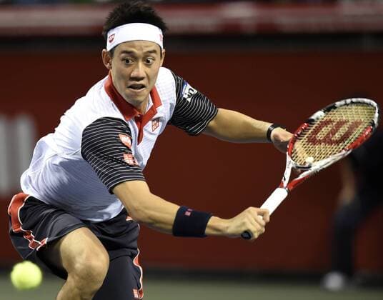 (141001) -- TOKYO, Oct. 1, 2014 -- Kei Nishikori of Japan hits a return during the first round match at the Rakuten Japan Open Tennis Championships 2014 in Tokyo, Japan, Oct. 1, 2014. 