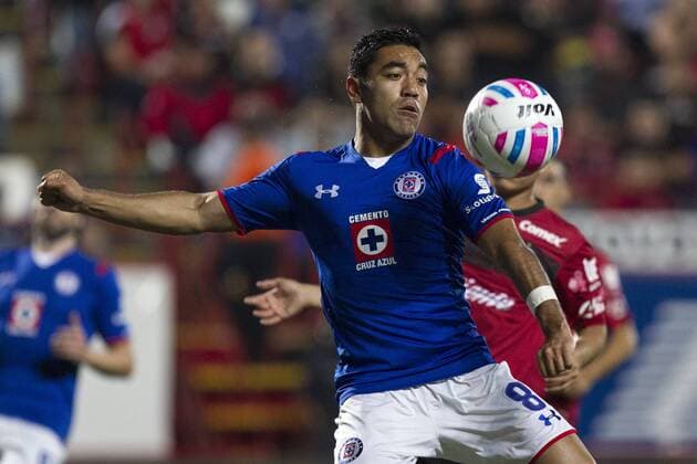 TIJUANA, Oct. 1, 2014 -- Juan Carlos Nunez (Back) of Xolos vies for the ball with Marco Fabian of Cruz Azul, during their match of the 2014 MX League Opening Tournament held at Caliente Stadium in Tijuana city, northwest Mexico, on Oct. 1, 2014. Guillermo Arias) (rt) (SP)MEXICO-TIJUANA-SOCCER-XOLOS VS CRUZ AZUL e GUILLERMOxARIAS 