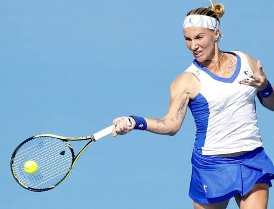 (141002) -- BEIJING, Oct. 2, 2014 -- Russia s Svetlana Kuznetsova returns a hit during the women s third round match at the 2014 China Open in Beijing, capital of China, on Sept. 30, 2014. ChenxJianli 