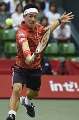(141002) -- TOKYO, Oct. 2, 2014 -- Kei Nishikori of Japan hits a return during the second round match at the Rakuten Japan Open Tennis Championships 2014 in Tokyo, Japan, Oct. 2, 2014. 