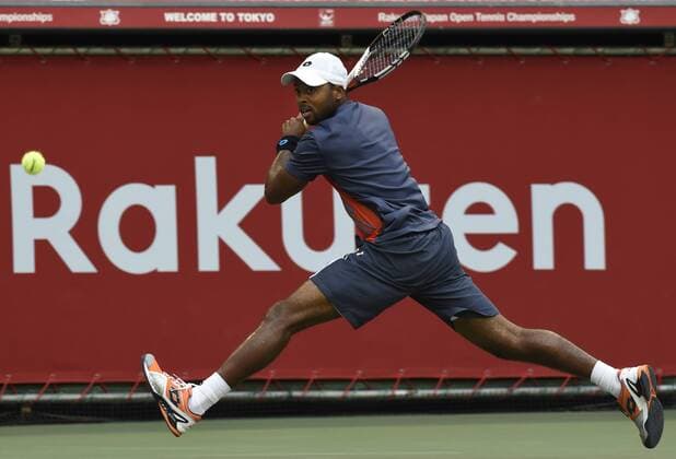 (141002) -- TOKYO, Oct. 2, 2014 -- Donald Young of the United States hits a return during the second round match at the Rakuten Japan Open Tennis Championships 2014 in Tokyo, Japan, Oct. 2, 2014. 