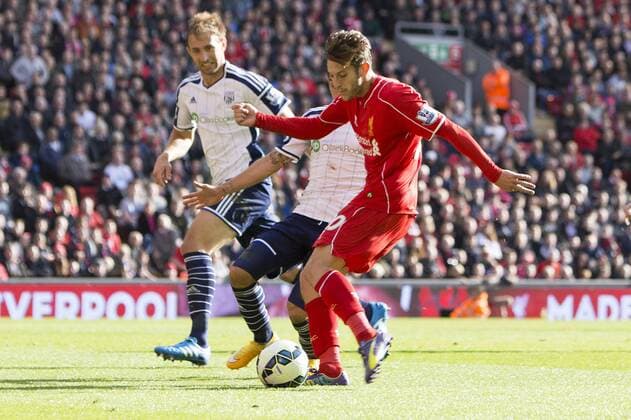 Adam Lallana of Liverpool scores the opening goal - FC Liverpool vs. West Bromwich Albion - Barclay s Premier League - Anfield - Liverpool - 04 10 2014 EDITORIAL USE ONLY. No use with unauthorised audio, video, data, fixture lists, club league logos or live services. Online in-match use limited to 120 images, no video emulation. No use in betting, games or single club league player publications.