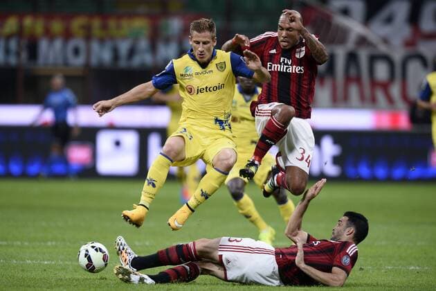 Db Milano 04 10 2014 - Serie A AC Milan vs AC Chievo Verona foto DanielexBuffa Image Sport Pictured: Valter-Birsa-Nigel De Jong-Adil Rami 