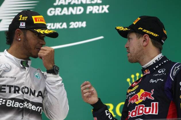 05.10.2014 - Race, 1st position Lewis Hamilton (GBR) Mercedes AMG F1 W05 and 3rd position Sebastian Vettel (GER) Red Bull Racing RB10 Japanese Grand Prix, Suzuka 2 - 5 October 2014 