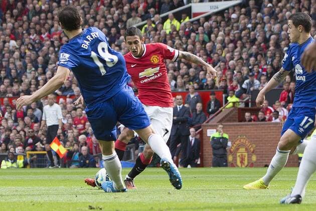 Angel di Maria of Manchester United scores the opening goal - Manchester United vs. Everton - Barclay s Premier League - Old Trafford - Manchester - 04 10 2014 Pic Philip Oldham Sportimage EDITORIAL USE ONLY. No use with unauthorised audio, video, data, fixture lists, club league logos or live services. Online in-match use limited to 120 images, no video emulation. No use in betting, games or single club league player publications.
