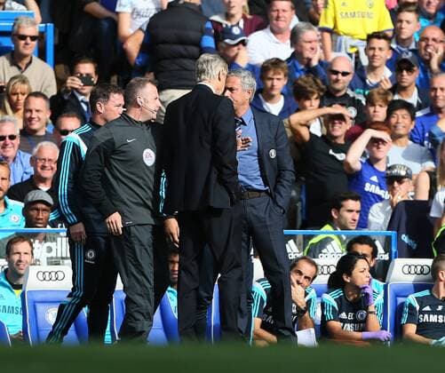 Chelsea s Jose Mourinho and Arsenal s Arsene Wenger square up to each other - Barclays Premier League - Chelsea Vs Arsenal - Stamford Bridge - England - 5th October 2014 - Picture David Klein Sportimage EDITORIAL USE ONLY. No use with unauthorised audio, video, data, fixture lists, club league logos or live services. Online in-match use limited to 120 images, no video emulation. No use in betting, games or single club league player publications.
