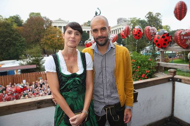 MUNICH, GERMANY - OCTOBER 05: Josep Guardiola, head coach of Bayern München attends with his wife Cristina Guardiola the Oktoberfest beer festival at Kaefer Wiesnschaenke tent at Theresienwiese on October 5, 2014 in Munich, Germany. Local Caption Josep Guardiola; Cristina Guardiola
