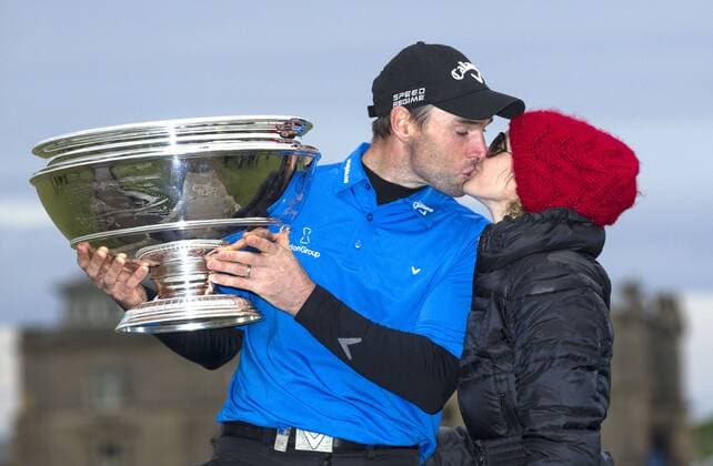 5.10.2014.St Andrews, Scotland. Alfred Dunhill Links Championship. Winner Oliver Wilson gets a kiss from Wife Lauren xMarkxDavisonx  ActionPlus20532979