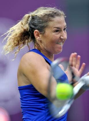 Shahar Peer of Israel returns a hit during the women s singles 1st round match at the 2014 Tianjin Open tennis tournament in Tianjin, north China, on Oct. 7, 2014. (SP)CHINA-TIANJIN-TENNIS-WTA-OPEN YuexYuewei 