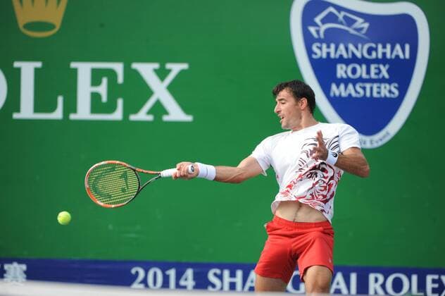 Ivan Dodig of Croatia returns a shot in the second round of the men s singles during the 2014 Shanghai Rolex Masters tennis tournament in Shanghai, China, 8 October 2014  20141008_62179