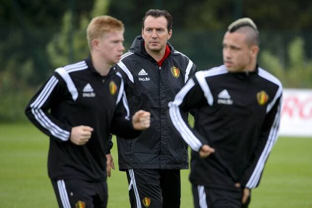 - BRUSSELS, BELGIUM: Belgium s Kevin De Bruyne, Belgium s head coach Marc Wilmots and Belgium s Radja Nainggolan pictured during a training session of Belgian national soccer team Red Devils, Wednesday 08 October 2014, in Brussels. Belgium will play Euro 2016 qualification games against Andorra on October 10th and against Bosnia on October 13th. DIRKxWAEM  premiumd 04478356