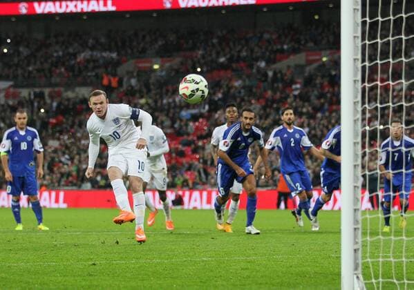 England s Wayne Rooney scoring his sides second goal - Euro 2016 Qualification - England vs San Marino - Wembley Stadium - England - 9th October 2014 - Picture David Klein Sportimage EDITORIAL USE ONLY. No use with unauthorised audio, video, data, fixture lists, club league logos or live services. Online in-match use limited to 120 images, no video emulation. No use in betting, games or single club league player publications.