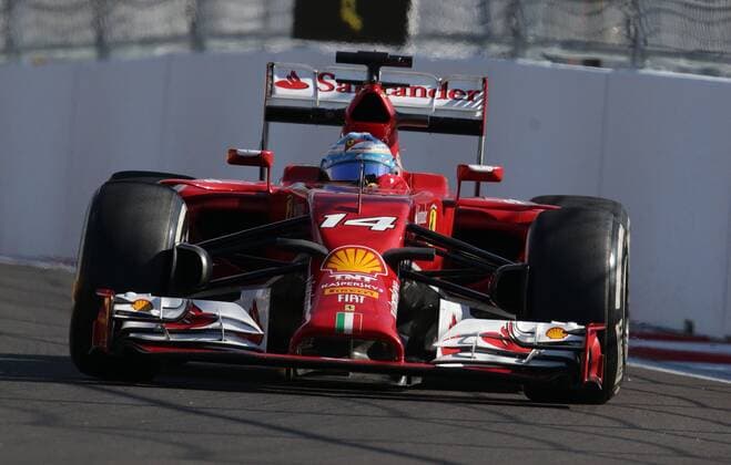 SOCHI, RUSSIA. OCTOBER 10, 2014. Spanish racing driver Fernando Alonso of the Scuderia Ferrari F1 team participates in the first free practice session of the 2014 Formula One Russian Grand Prix at the Sochi Autodrom racing circuit. StanislavKrasilnikov TASS  RE151828