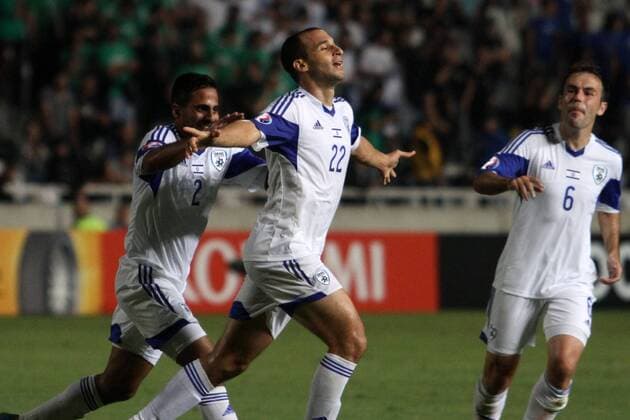 Israel s players celebrate a goal during the Euro 2016 qualifying soccer match between Israel and Cyprus at Gsp Stadium in Nicosia, Cyprus, on Tuesday, Oct. 10, 2014