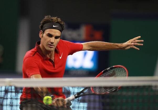 (141011) -- SHANGHAI, Oct. 11, 2014 -- Roger Federer of Switzerland returns the ball during the men s singles semifinal match at the Shanghai Masters tennis tournament in Shanghai, east China, Oct. 11, 2014. (SP)CHINA-SHANGHAI-TENNIS-ATP-SHANGHAI MASTERS (CN) RenxLong 