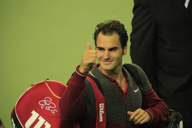 Roger Federer of Switzerland shows a thumb-up in the semifinals of the men s singles during the 2014 Shanghai Rolex Masters tennis tournament in Shanghai, China, 11 October 2014.  20141011_14351