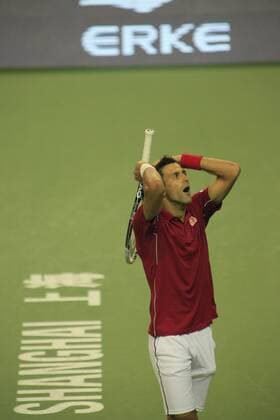 Novak Djokovic of Serbia reacts after losing scores in the semifinals of the men s singles during the 2014 Shanghai Rolex Masters tennis tournament in Shanghai, China, 11 October 2014.  20141011_30878