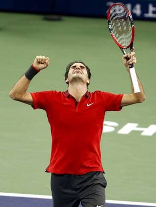 Roger Federer of Switzerland celebrates victory after the men s singles final match at the Shanghai Masters tennis tournament in Shanghai, east China, Oct. 12, 2014. (SP)CHINA-SHANGHAI-TENNIS-ATP-SHANGHAI MASTERS (CN) FanxJun 