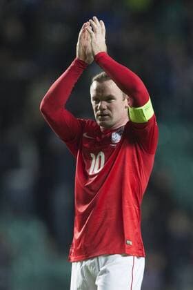 Wayne Rooney of Manchester United applauds the travelling fans - Estonia vs. England - UEFA Euro 2016 Qualifier - A. Le Coq Arena - Tallinn - 12 10 2014 Pic Philip Oldham Sportimage EDITORIAL USE ONLY. No use with unauthorised audio, video, data, fixture lists, club league logos or live services. Online in-match use limited to 120 images, no video emulation. No use in betting, games or single club league player publications.