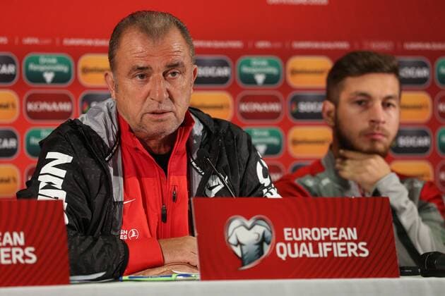 Turkey National Football Team head coach Fatih Terim and Player Gokhan Gonul during the press conference at Skonto Sadium in Riga on 12 October 2014 Pictured: Coach Fatih Terim 