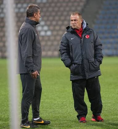 Turkey National Team Players during the last training at Skonto Sadium in Riga on 12 October 2014 Pictured: Coach Fatih Terim and Co trainer Hamza Hamzaoglu 