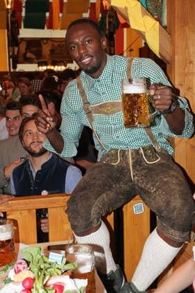 Usain Bolt, Wiesn 2014 Promis auf der Wiesn im Schuetzen Festzelt am Oktoberfest in München am 03.10.2014