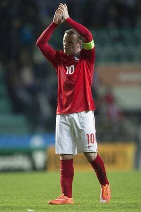 Wayne Rooney of Manchester United applauds the travelling fans - Estonia vs. England - UEFA Euro 2016 Qualifier - A. Le Coq Arena - Tallinn - 12 10 2014 Pic Philip Oldham Sportimage EDITORIAL USE ONLY. No use with unauthorised audio, video, data, fixture lists, club league logos or live services. Online in-match use limited to 120 images, no video emulation. No use in betting, games or single club league player publications.